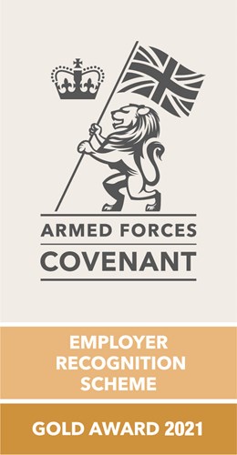 Armed Forces Covenant logo with Gold Award 2021 written against a gold background