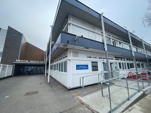 Photo of the entrance to the Mental Health Urgent Care Department at Basildon Hospital, just to the right of the existing mental health unit