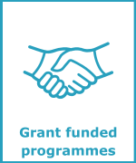 Teal coloured handshake icon. Text: Grant funded programmes