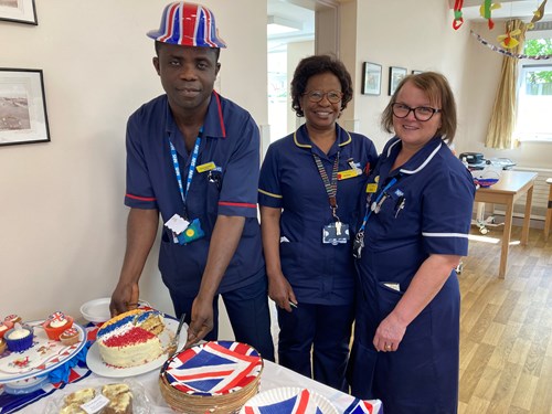 Staff at the Cumberlege Intermediate Care Centre with cakes